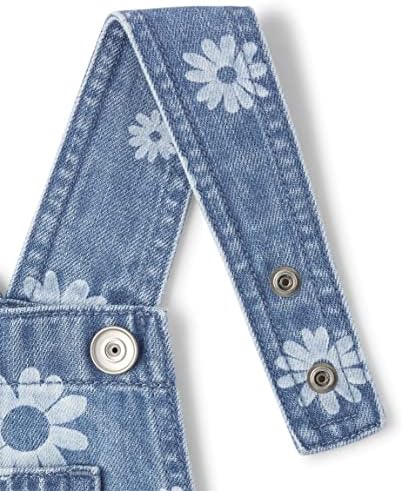 O Macacão de jeans de jeans de garotas para crianças infantis