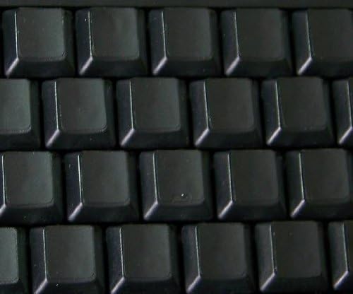 Adesivo em branco do teclado no fundo preto